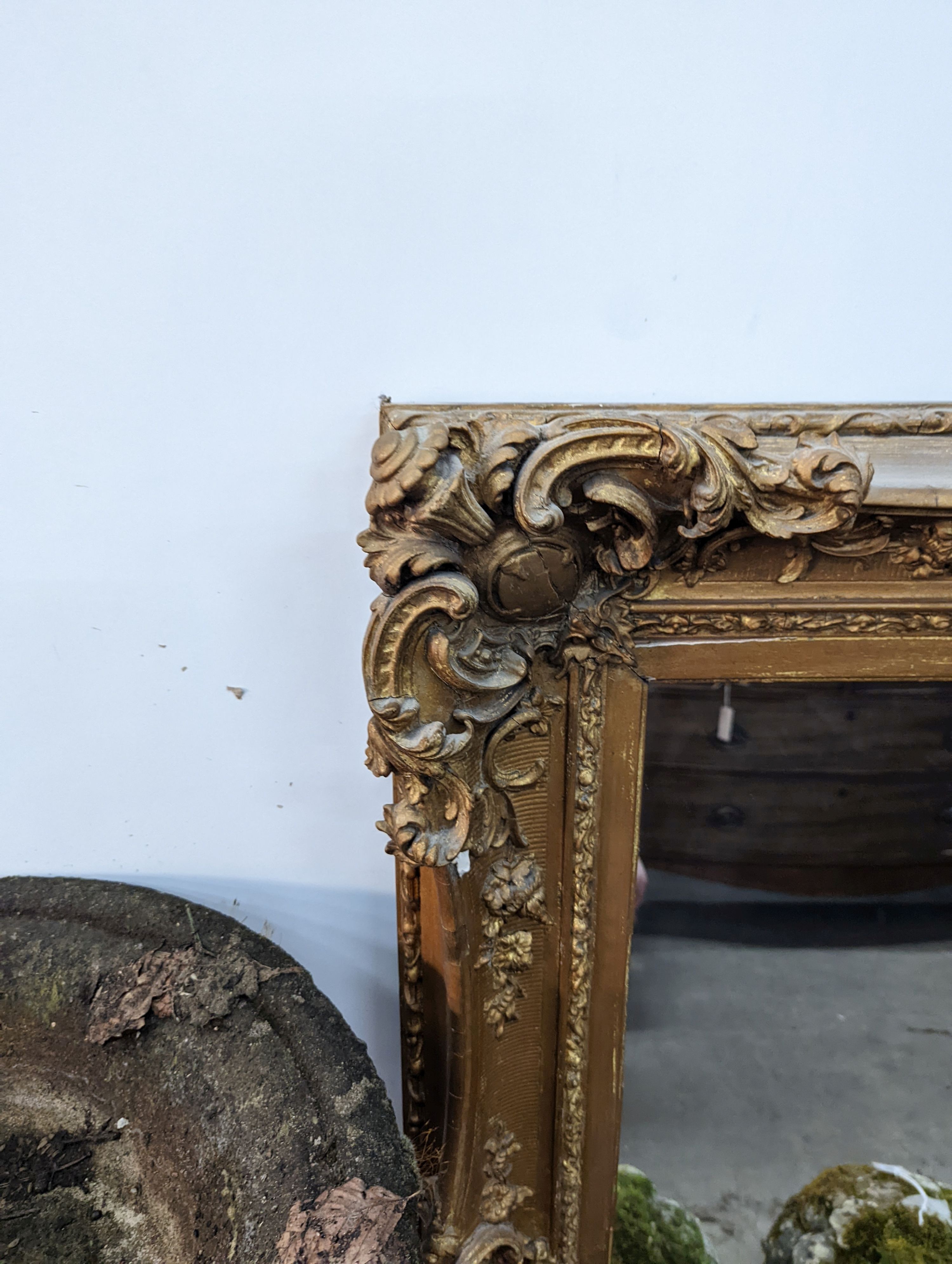 A late Victorian giltwood and gesso rectangular wall mirror, width 100cm, height 122cm